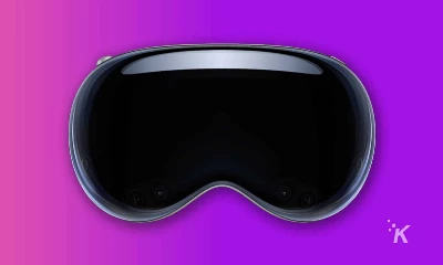 Apple Vision Pro headset front in purple background
