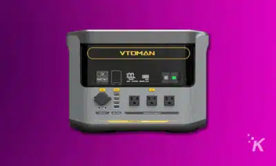 VTOMAN portable power station on purple background.