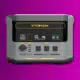 VTOMAN portable power station on purple background.
