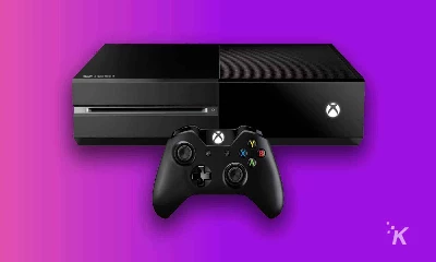 xbox one and xbox controller on purple background