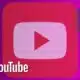 YouTube logo on vibrant purple gradient background.